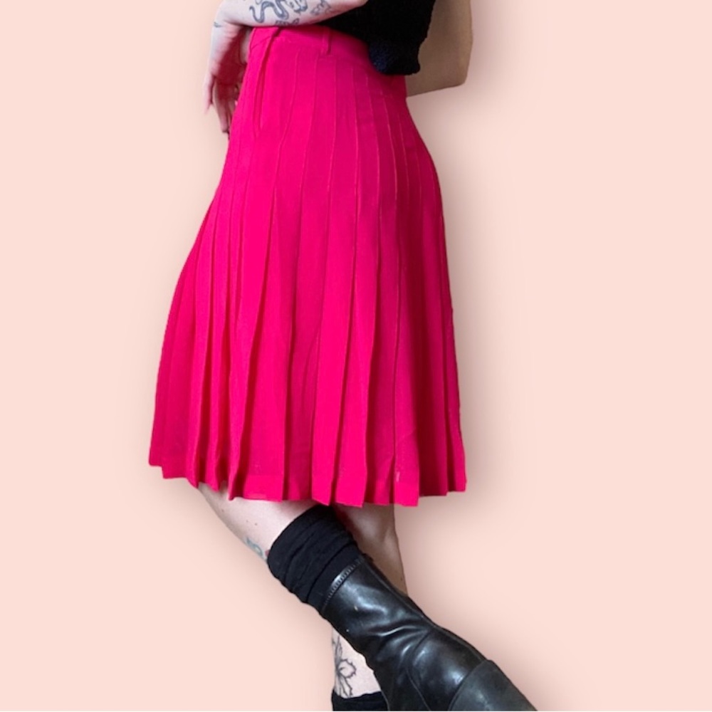 Bright pink pleated midi tennis skirt